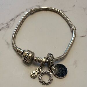 Pandora Silver Charm Bracelet with dark blue glitter Accents